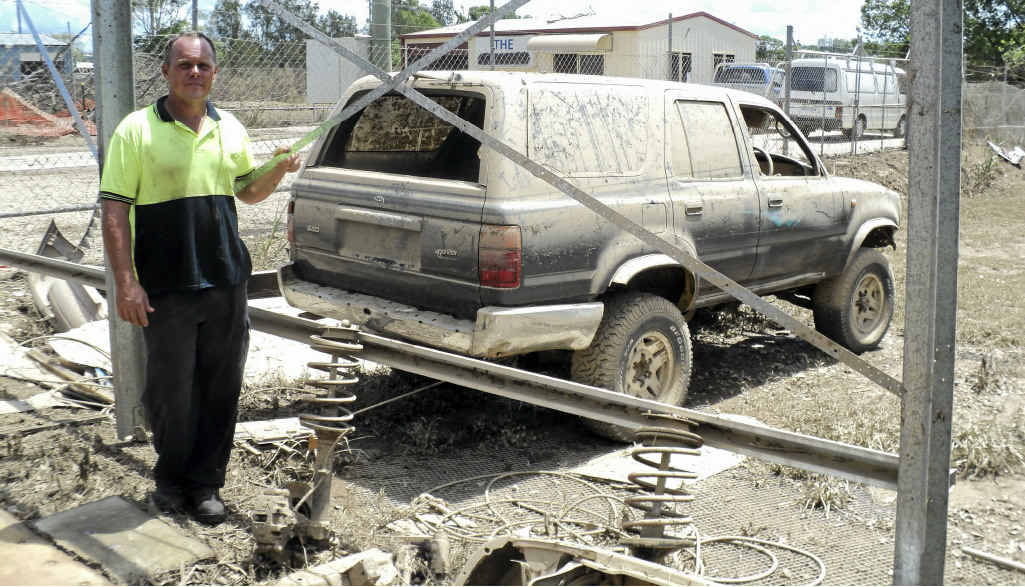 Vehicles, motors and parts were destroyed in the flood. Vehicles, motors and parts were destroyed in the flood.
